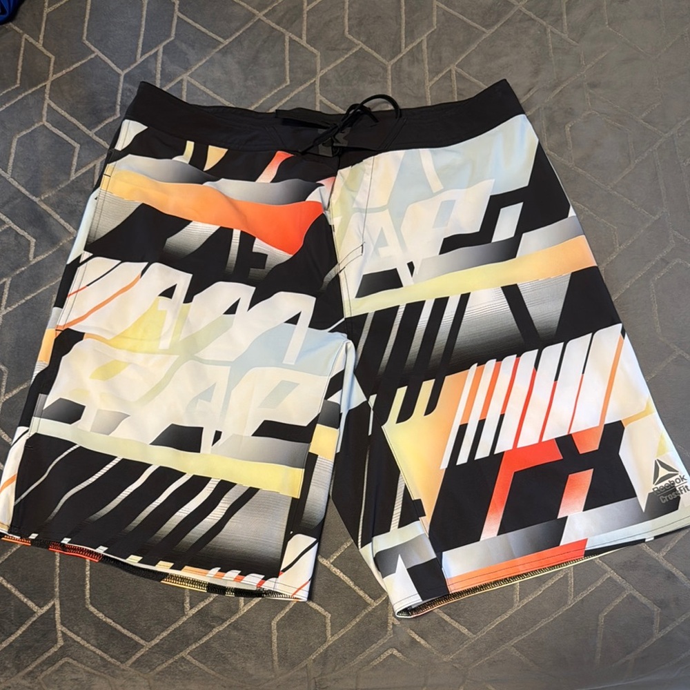 Reebok CrossFit Athletic Black and Orange Board Shorts with Geometric Design